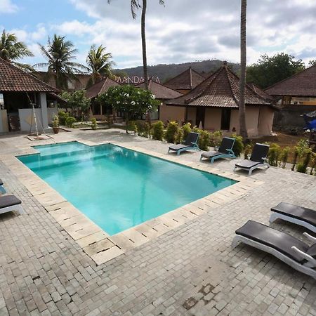 โอโย 1651 ปูรนามา บีช โฮเต็ล Hotel Kuta  ภายนอก รูปภาพ