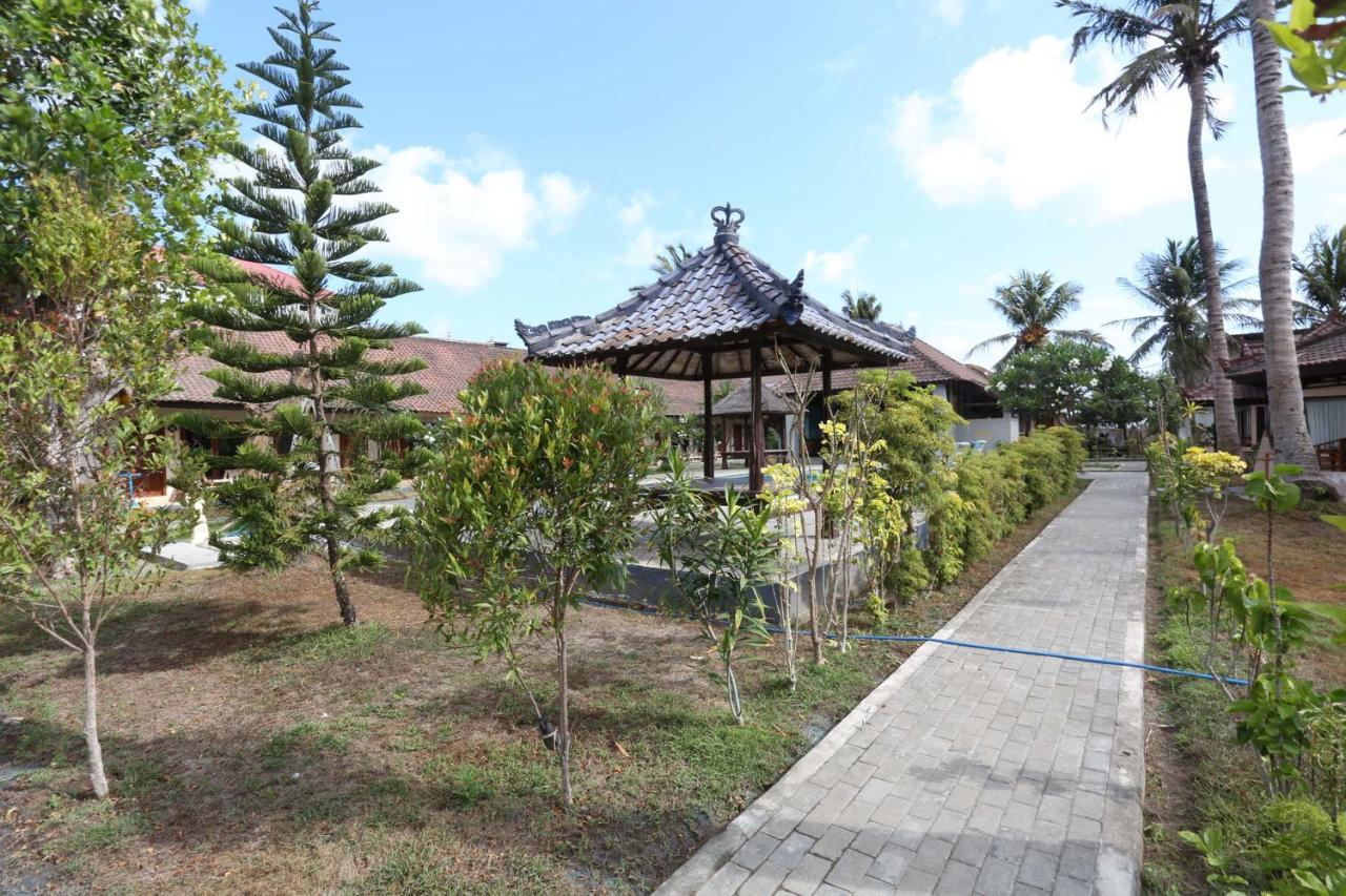 โอโย 1651 ปูรนามา บีช โฮเต็ล Hotel Kuta  ภายนอก รูปภาพ
