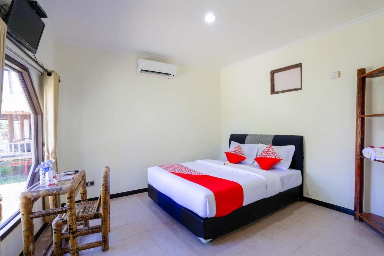 โอโย 1651 ปูรนามา บีช โฮเต็ล Hotel Kuta  ภายนอก รูปภาพ