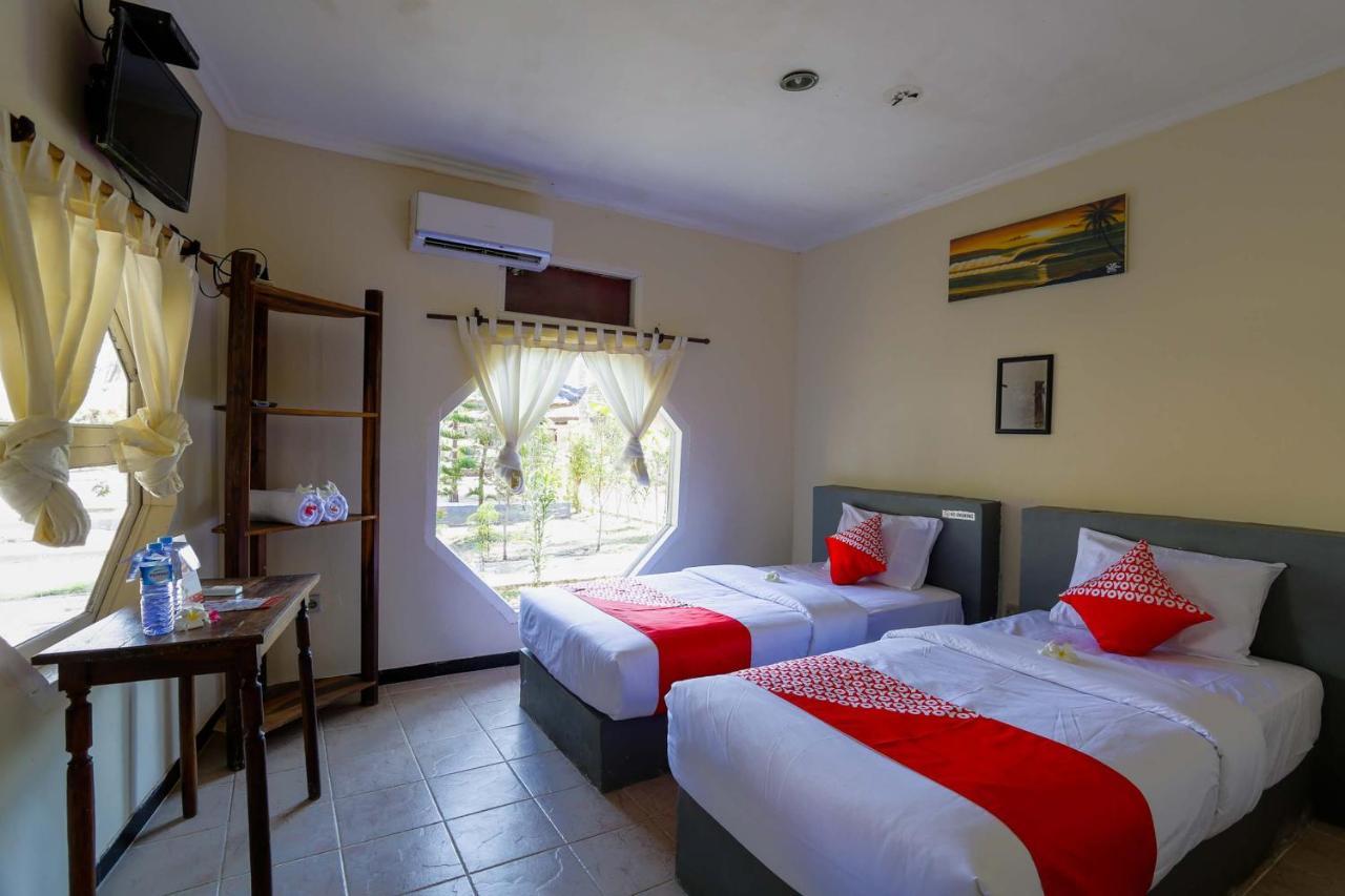 โอโย 1651 ปูรนามา บีช โฮเต็ล Hotel Kuta  ภายนอก รูปภาพ
