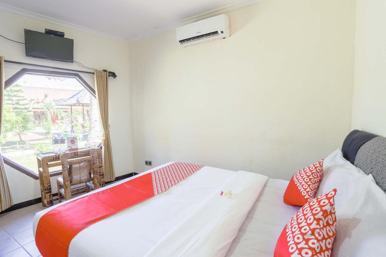 โอโย 1651 ปูรนามา บีช โฮเต็ล Hotel Kuta  ภายนอก รูปภาพ